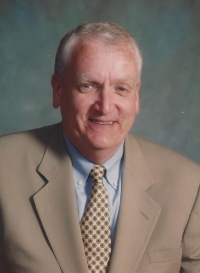 NEIL CAROLAN
